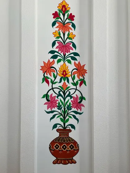 Close-up of one of the Kalamkari floral vase paintings.