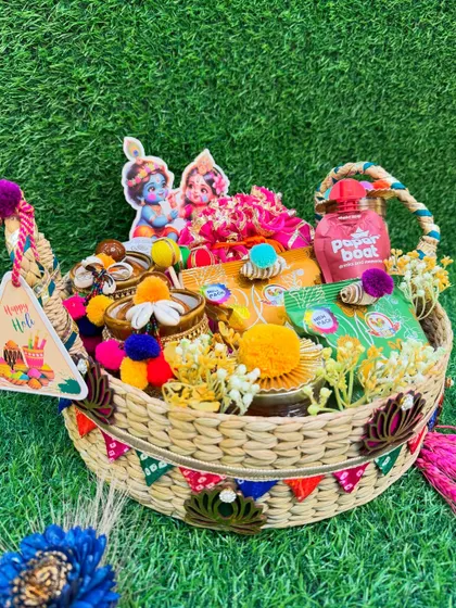 Another angle of our boat-shaped Holi hamper, showcasing the vibrant colors and thoughtful details that make it a perfect festive gift.