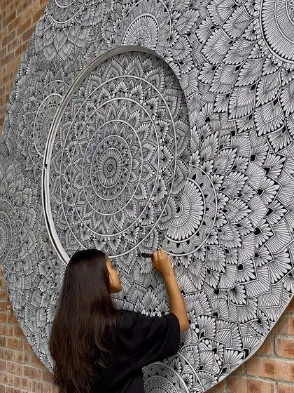 A close up shot of me working on the intricate patterns of the Malaysia mural. Every single detail was hand drawn on site over 200 hours.