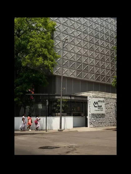 The entrance to the MAP museum from the street. The design is intended to be accessible and inviting, breaking down the traditional barriers of a museum and encouraging the public to engage with the space.