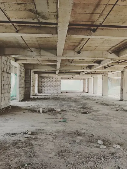 A wide view of a floor in the commercial building, showing the large, open-plan space typical of modern office design.