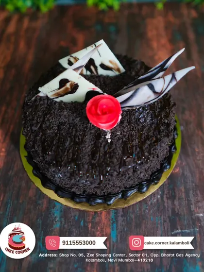 A classic chocolate truffle cake with a single red rose. The rich chocolate shavings and simple decoration make it a perfect, delicious gift.