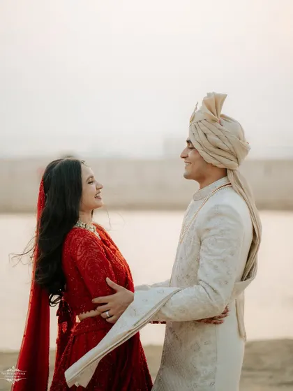 A candid moment of laughter and movement. I love capturing the unposed, in-between moments that show a couple's true personality.