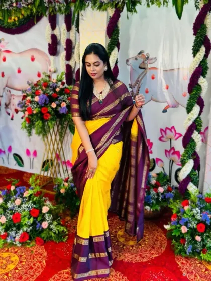 Mukta looking vibrant in a yellow and purple Irkal saree. I designed a matching striped blouse to complement the traditional weave of the saree.