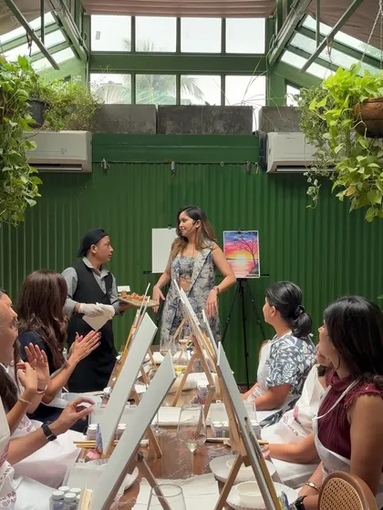 Just me, behind a mic, being my goofy self. Hosting these paint parties is genuinely my happy place.