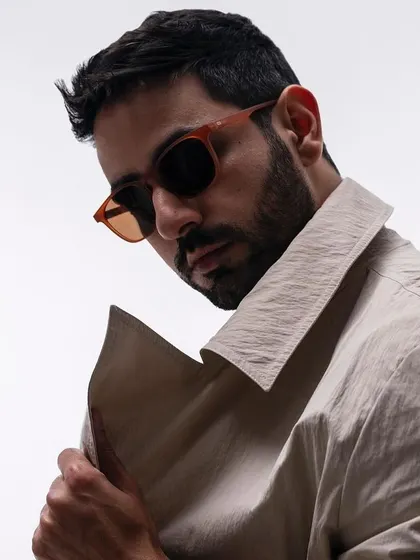 A portrait of Daman Reyar for Lenskart's Valentine's 2024 campaign, shot against a clean white background in our studio.