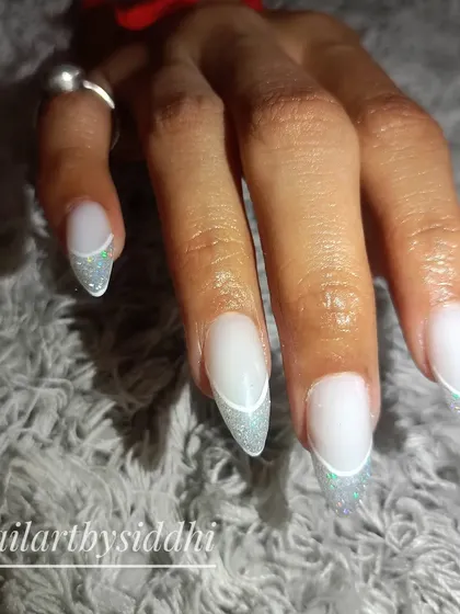 A still shot of the open French glitter nails, showing the clean lines and subtle sparkle.
