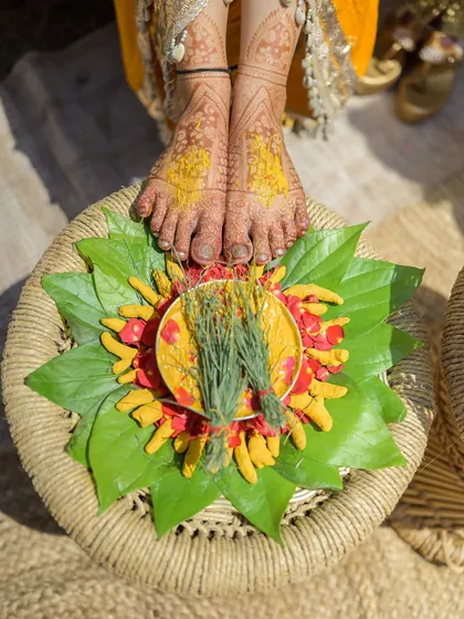 A beautiful detail shot capturing the traditional elements of the Haldi ceremony.