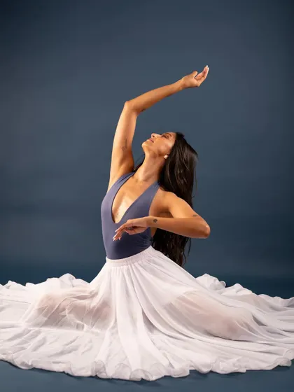 A grounded pose from the 'swan song' series, showcasing both strength and softness.