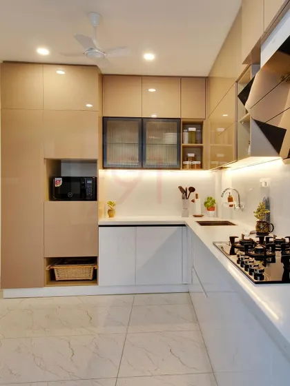 This view shows the well-planned layout, including a dedicated unit for the microwave and ample storage.