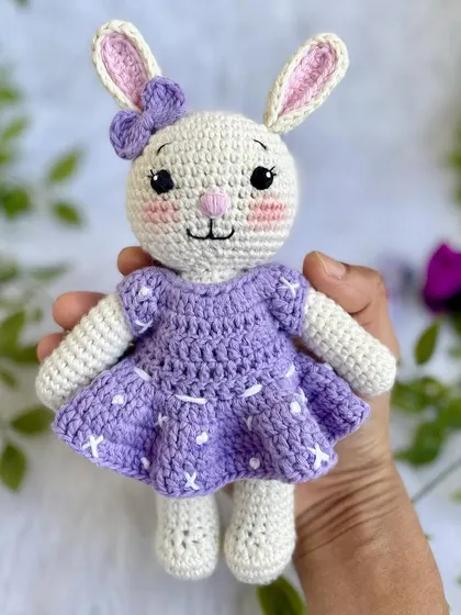 A lovely bunny in a purple dress with a custom initial "Q" on it. I made a similar one for my own daughter's birthday, and she absolutely adores it!