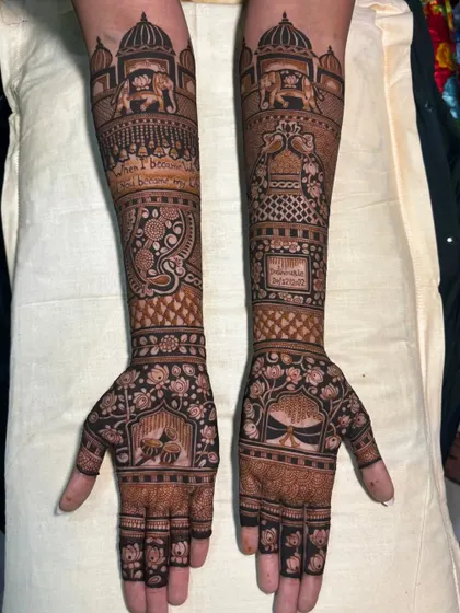 This design showcases a mix of popular traditional motifs. You can see elephants, lotuses, and a space for a mantra or quote, all tied together with classic floral and geometric patterns.