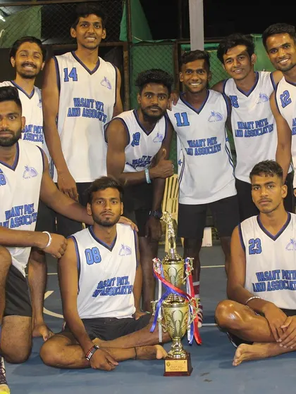 The team posing with the runner-up trophy.