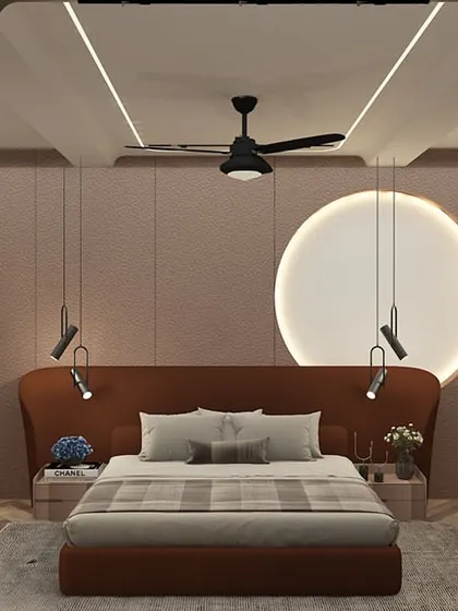 A bedroom design with a warm, earthy color palette, featuring a rust-colored headboard and a circular backlit element on the wall.