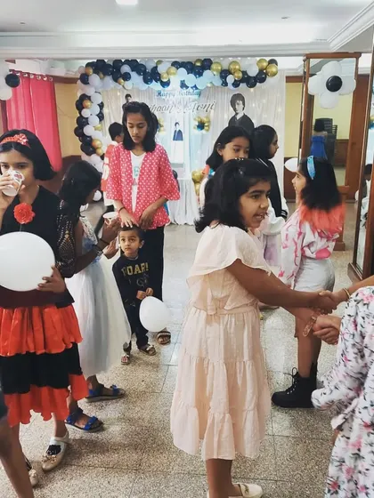 Children enjoying party games at Vihaan and Avni's birthday celebration. We believe in creating an interactive atmosphere, and our game hosts ensure all the young guests are engaged and having a wonderful time.