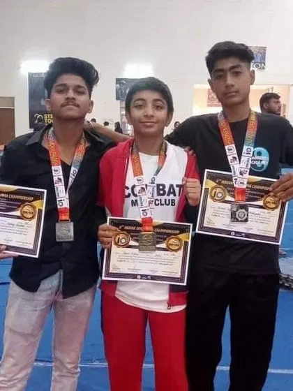 The proof is in the results. I am incredibly proud of our students who compete and win at the highest levels. Here are some of our champions displaying their medals and certificates from a national MMA championship.