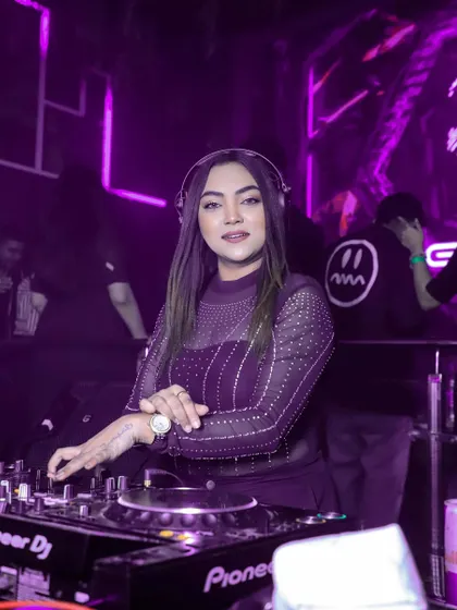 Doing life with music. A beautiful shot of me at the console, surrounded by purple light.
