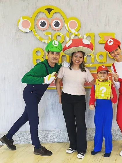 This photo captures the heart of what I do. This wonderful family celebrated their son's 7th birthday with a Super Mario theme, and they even dressed the part. It’s a joy to host their celebrations year after year.