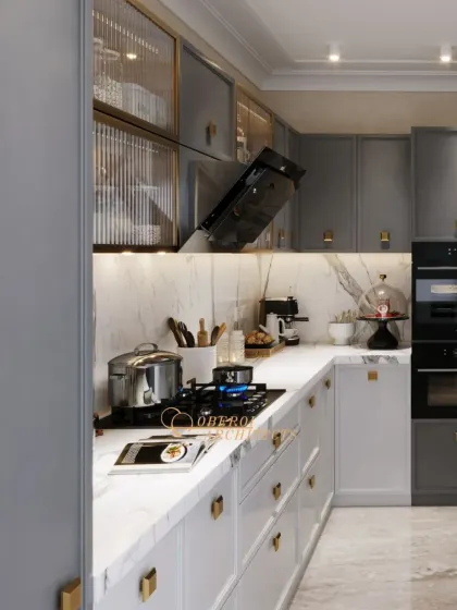 This angle highlights the fluted glass overhead cabinets and under-cabinet lighting, which add texture and provide beautiful ambient light.
