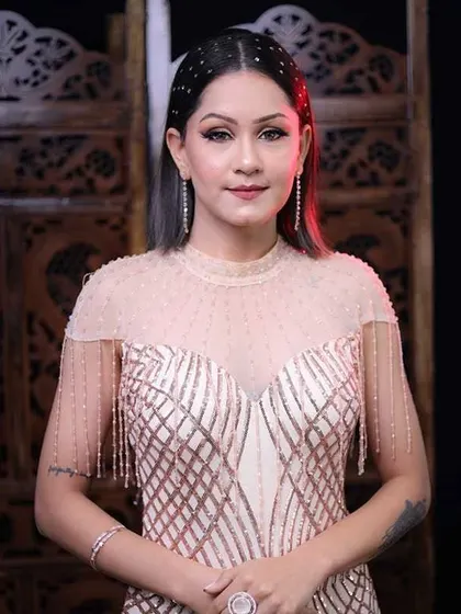 A final portrait of this stunning party look. The makeup is flawless, the hair is perfect, and she is ready to own the night.
