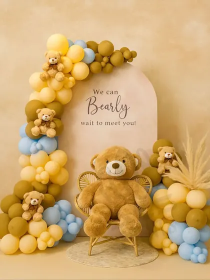 We can 'bearly' wait to celebrate with you. This adorable teddy bear theme is one of our most requested baby shower setups, featuring a custom arch, soft pastel balloons, and a cuddly teddy bear ready to welcome your little one.