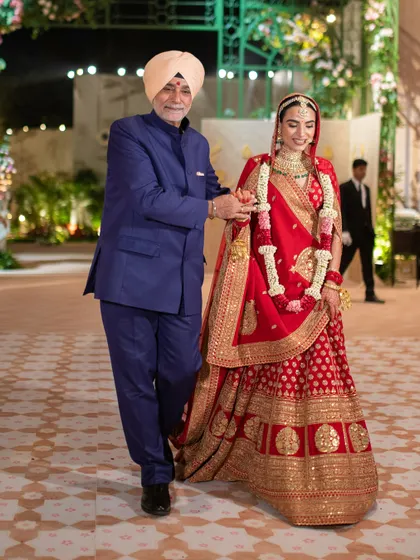 A beautiful moment as the bride walks down the aisle with her father. Our work is about creating the perfect setting for these priceless family memories.