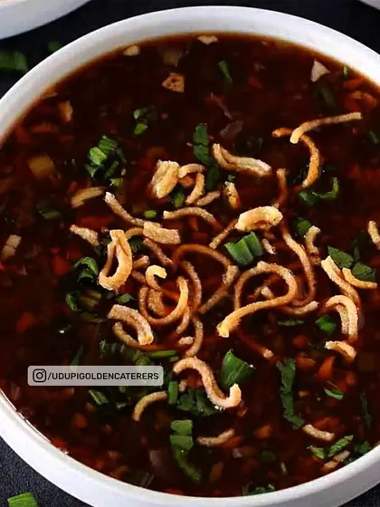 Our Veg Manchow Soup is a flavorful Indo-Chinese soup topped with crispy fried noodles. Its spicy and sour notes make it a very popular choice.