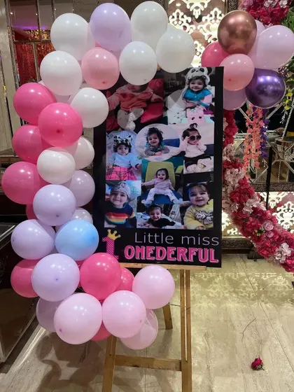 A personalized "Little Miss ONEderful" photo collage board I made for the princess party.