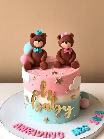 A sweet "Oh Baby" gender reveal cake with teddy bear toppers. The pink and blue colors build anticipation for the big announcement.