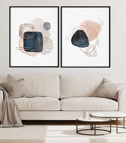 This set of two framed prints showcases abstract geometric patterns in a stylish and modern design. The combination of navy, pink, and beige creates a chic and contemporary look.
