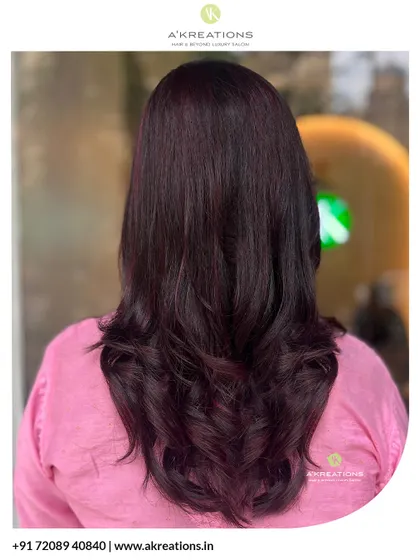 A classy and bold burgundy color transformation. We gave our client this rich, wine-red shade for a sophisticated and modern look.