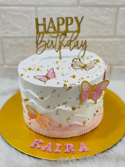 Another angle of the popular pink butterfly cake, a favorite design for all ages.