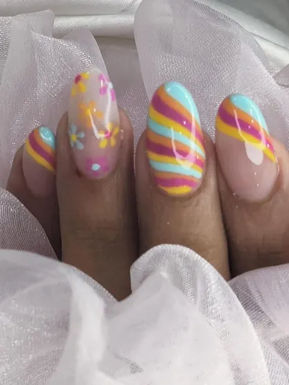 A colorful and creative design with a mix of wavy rainbow stripes and delicate floral patterns, perfect for a cheerful, summery look.