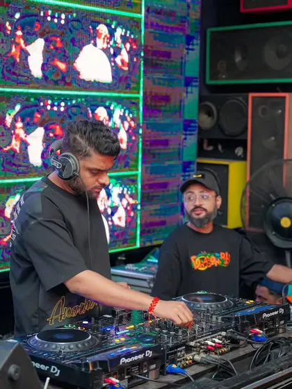 A back to back set in progress, with live VDJ visuals playing on the screen. I often team up with other DJs to deliver a dynamic and varied musical journey.