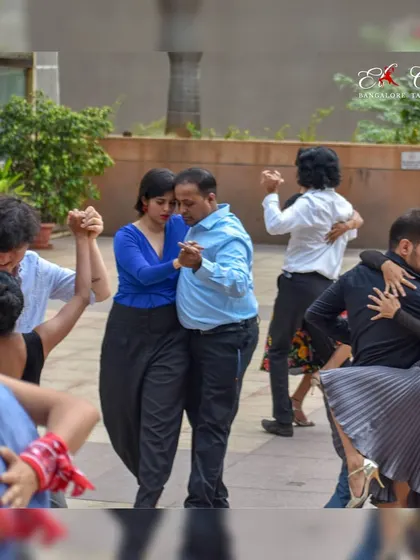 More scenes from our UB City flash mob. You can see multiple couples dancing together, creating a beautiful spectacle of movement and connection in the open space.