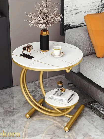 This C-shaped metal coffee table is designed for modern living. The gold-finish frame slides easily under a sofa, making the top surface a convenient spot for a laptop or a meal.