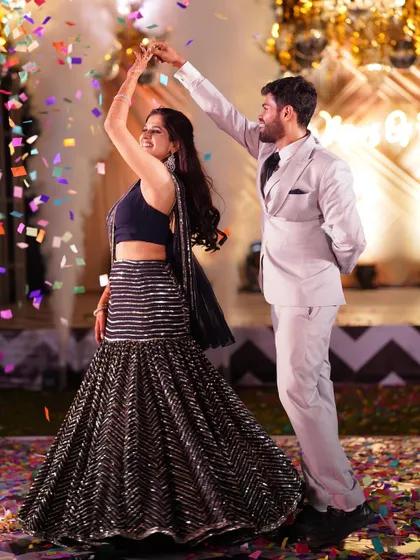 A close-up of the couple's first dance, surrounded by a shower of colorful confetti. These are the picture-perfect moments I strive to create.