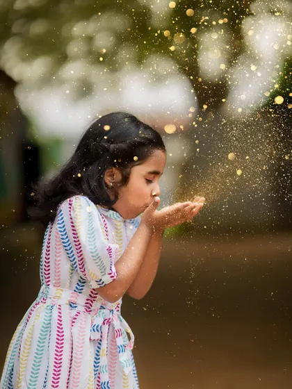 Another magical glitter shot. The way the golden glitter catches the light creates a truly enchanting effect.