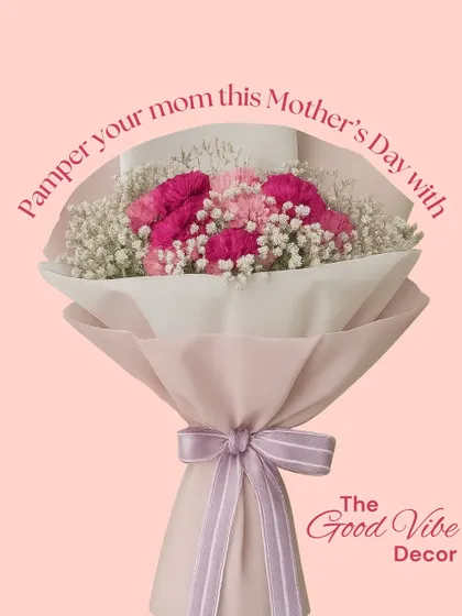 A simple and sweet bouquet perfect for Mother's Day. This arrangement features lovely pink carnations and delicate baby's breath, wrapped in soft pink paper and tied with a lavender ribbon.