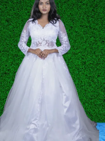 This beautiful white gown with sheer, embroidered long sleeves is a perfect rental option for a Christian wedding or a pre-wedding shoot.