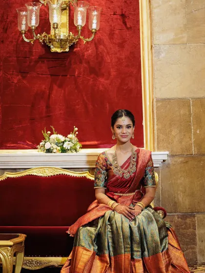 A royal portrait of Thuranya on her special day. The makeup is kept classic and elegant to match the grandeur of her half saree and the venue.