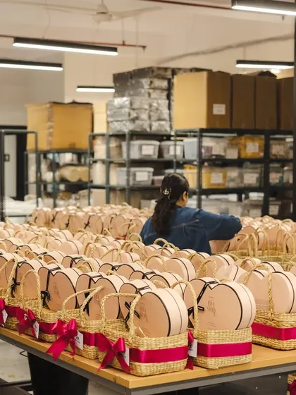 Our workshop filled with hundreds of hampers for Hyundai's Women's Day order. This image captures the scale of the projects we handle.