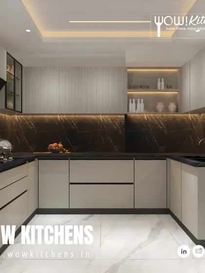 This U-shaped layout demonstrates our ability to maximize counter space and storage in any room, using a dark marble backsplash to create a continuous, luxurious feel.