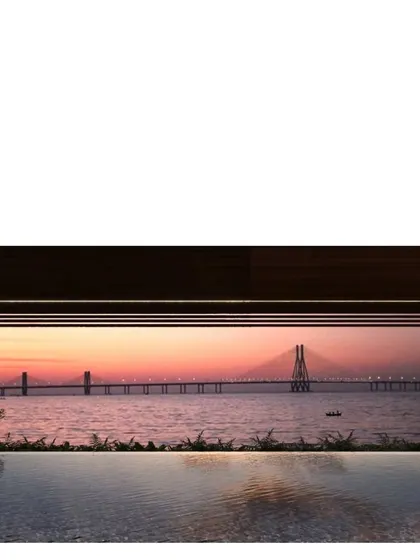 A view of the Bandra Worli Sea Link from a penthouse project in Bombay. Our design for this space frames the iconic cityscape, creating a seamless connection between the luxurious interior and the sprawling metropolis outside.
