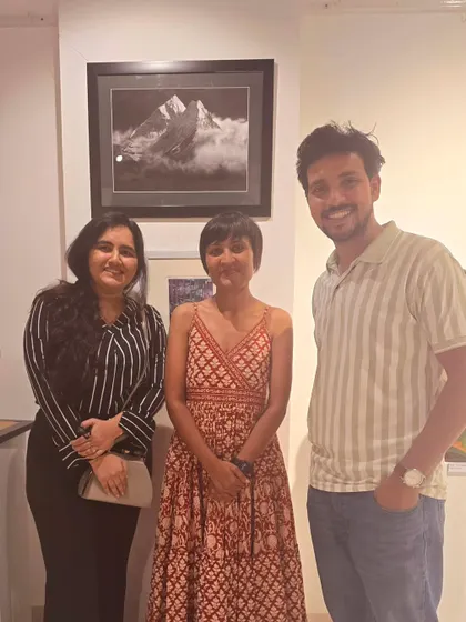 A photo of me at the gallery event in Hyderabad. It's always wonderful to connect with other artists and see my work in a professional setting.
