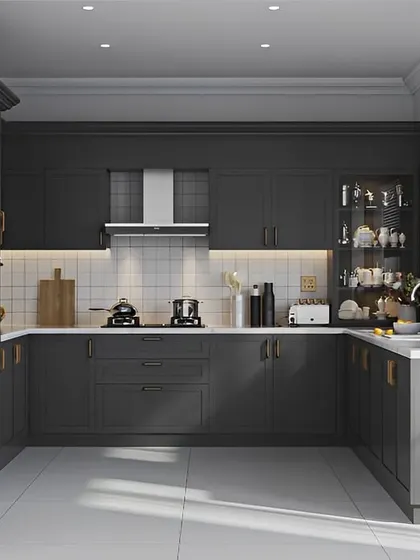 This elegant U-shaped kitchen features matte dark grey cabinets with subtle brass handles. The white subway tile backsplash and integrated appliances create a timeless and sophisticated look.