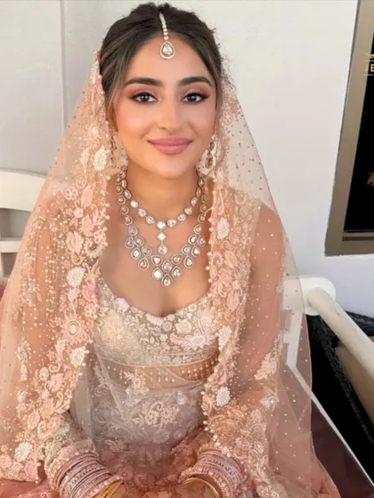 Embrace the elegance of your wedding day with our bridal Polki collection. This stunning set, complete with a maang tikka, is designed to make you feel like royalty.