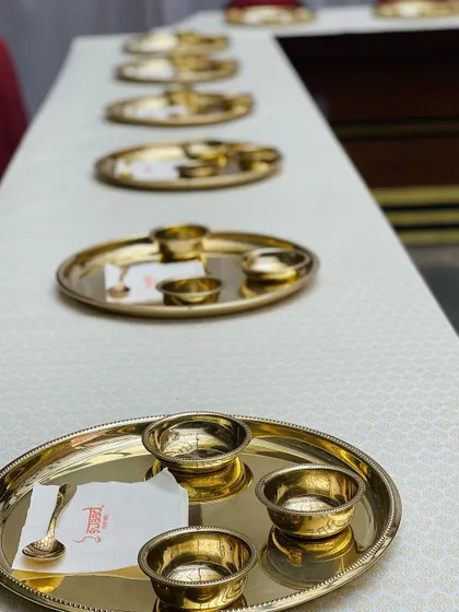 Another view of the elegant table setting for a formal sit-down dinner. This setup is ideal for corporate events, sangeets, and wedding receptions where a touch of class is desired.