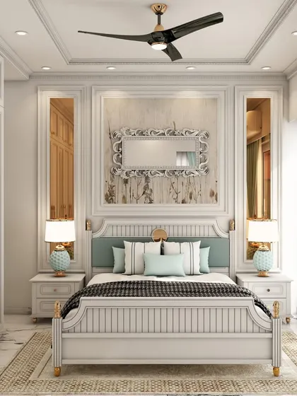 This traditional bedroom design features classic wall paneling, ornate mirrors, and a beautifully crafted bed frame, creating a timeless and elegant atmosphere.