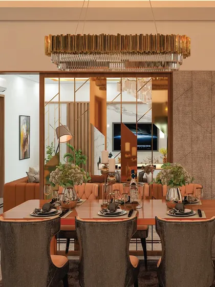 This image shows the dining area with a mirrored partition, which reflects the living space and makes the entire area feel more expansive. The statement chandelier adds a touch of luxury, perfect for elegant dinners.